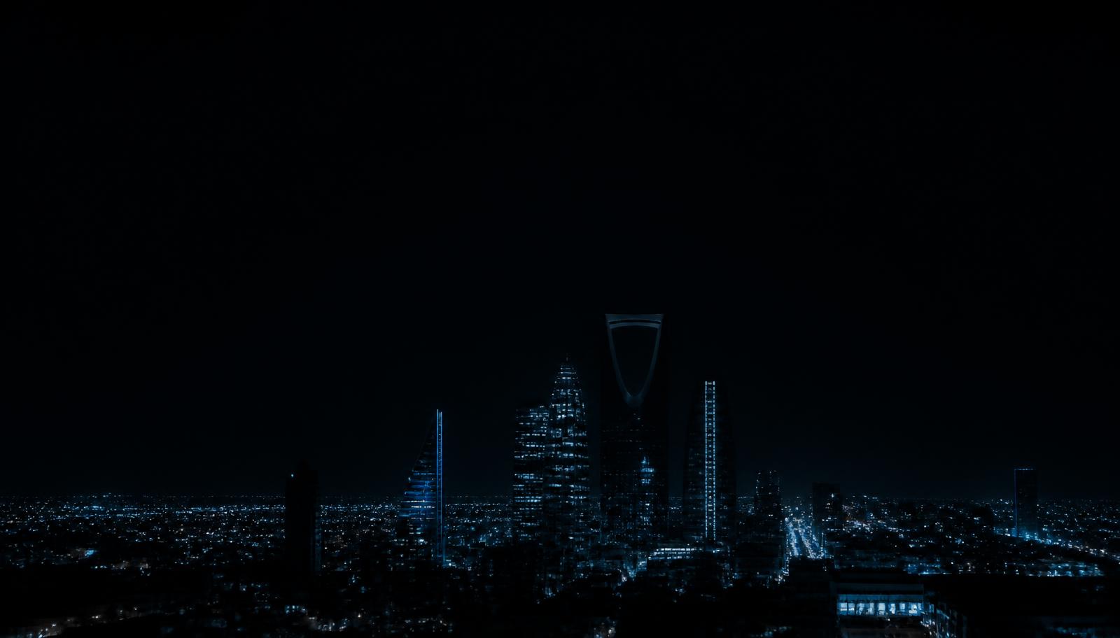 Riyadh skyline at night with illuminated towers
